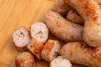Linguiça de Frango com Chimichurri servida na tábua, cortada na hora