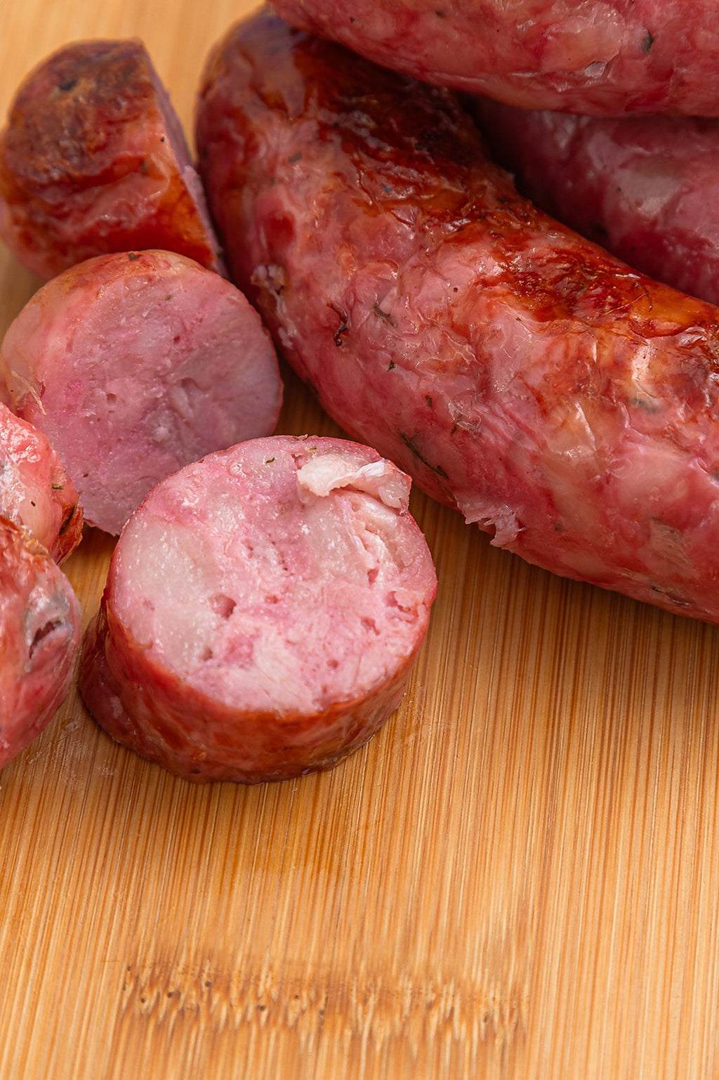 Detalhe da Linguiça de Pernil: variável entre 450 e 600 g