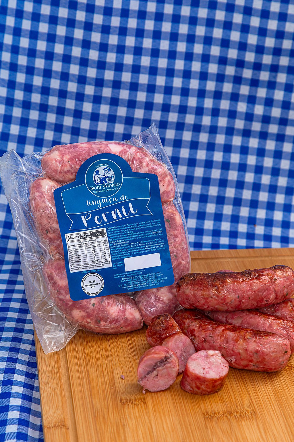 Linguiça de Pernil da Salumeria Dom Aloísio, amarrada em gomos de 12 cm, conservada sob congelamento